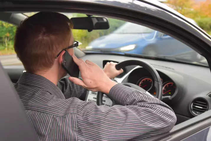 A fifth of firms say drivers in accidents due to using handheld phones at the wheel