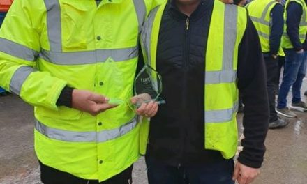 Employees at UK Container Maintenance celebrate ten years’ service