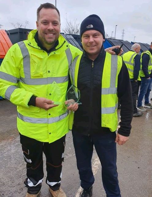 Employees at UK Container Maintenance celebrate ten years’ service