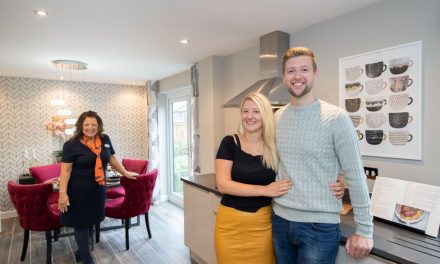 Engagement for couple as they buy their first home in Hyde