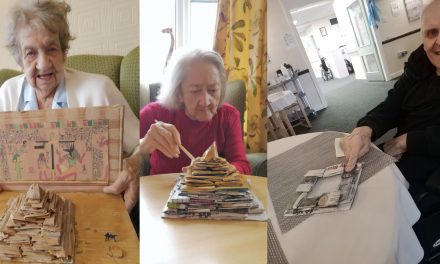 Residents build paper pyramid for archaeology competition