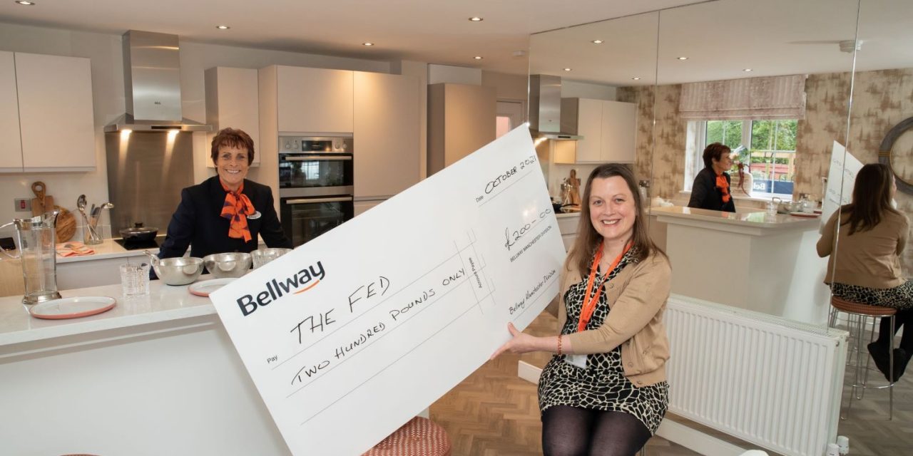 Prestwich charity receives donation from Bellwaya