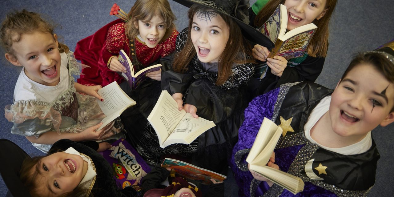 Homebuilder gifts reading books to local Cheshire primary school