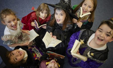 Homebuilder gifts reading books to local Cheshire primary school