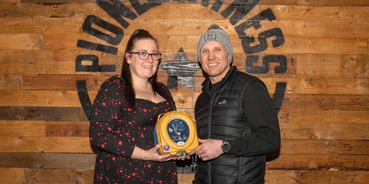 Bellway donates life-saving defib to Pioneer Fitness in Bootle
