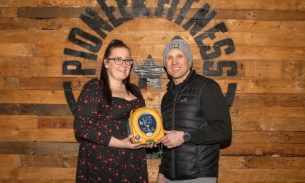 Bellway donates life-saving defib to Pioneer Fitness in Bootle