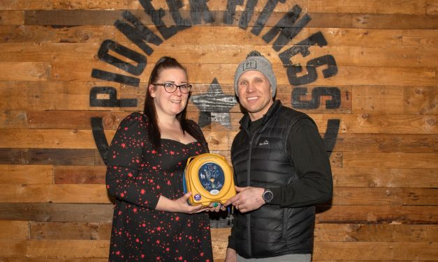 Bellway donates life-saving defib to Pioneer Fitness in Bootle