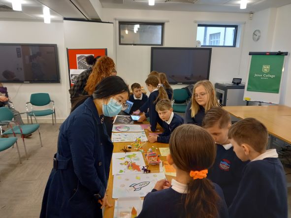 Primary school pupils inspired as they present their work at University of Oxford