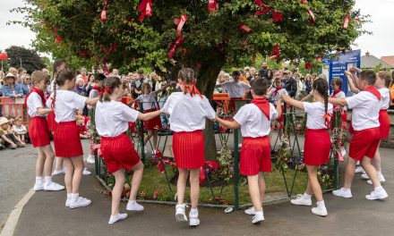Cheshire housebuilders make donation to traditional ‘Bawming the Thorn’ event in Appleton Thorn