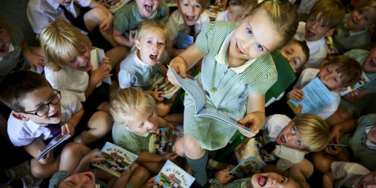 Lancashire homebuilder makes book donation to local school