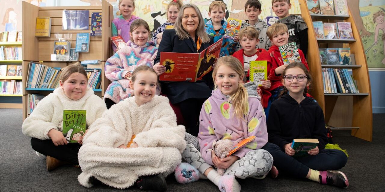 Bellway donates cash for books to schools in Greasby, Wirral