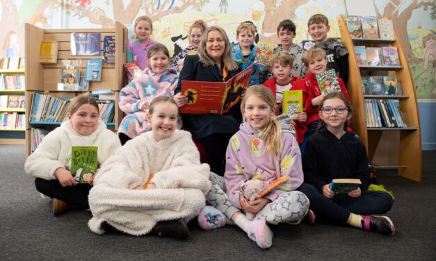 Bellway donates cash for books to schools in Greasby, Wirral