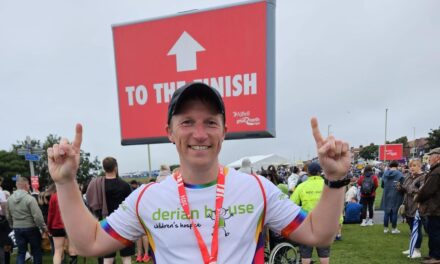 LAND DIRECTOR RUNS TO HELP HOSPICE
