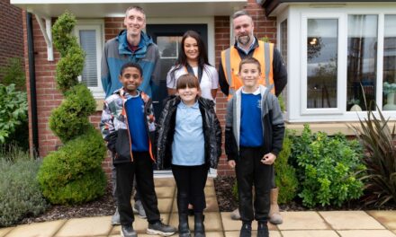 School children lay bricks at Deeside development