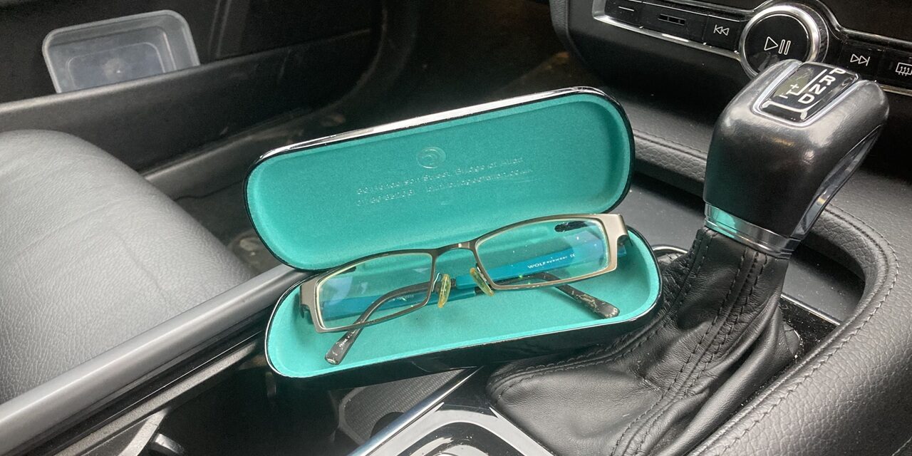 See sense with spare pair of glasses in the car