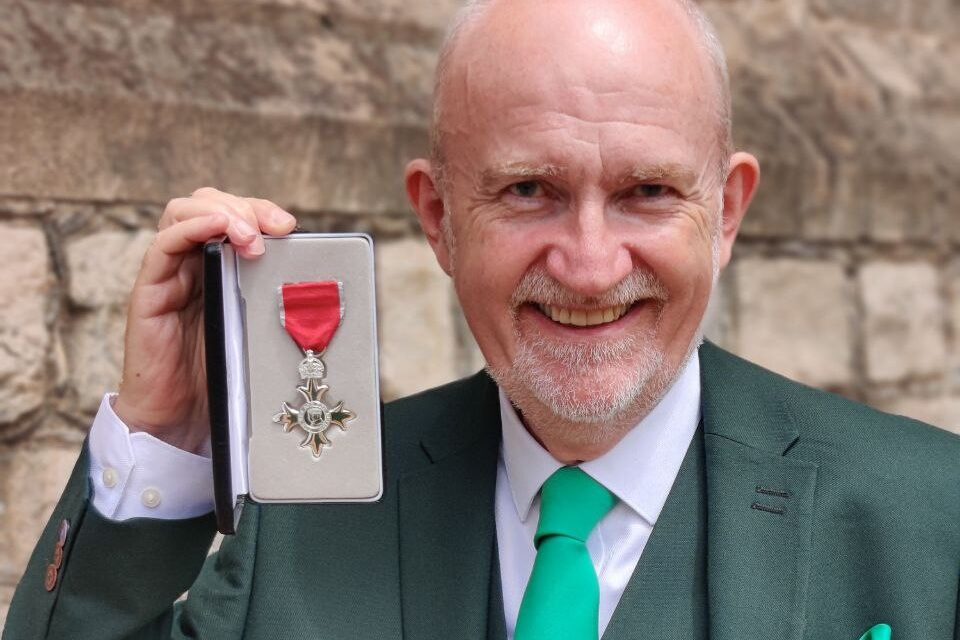 Previous chair of Candlelighters charity awarded MBE for services to cancer.