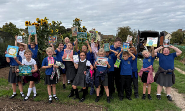 LOCAL SCHOOL CHILDREN AND RETIREES SHARE THEIR FAVOURITE BOOKS DURING AN AFTERNOON TO CELEBRATE GRANDPARENTS DAY IN STOW-ON-THE-WOLD